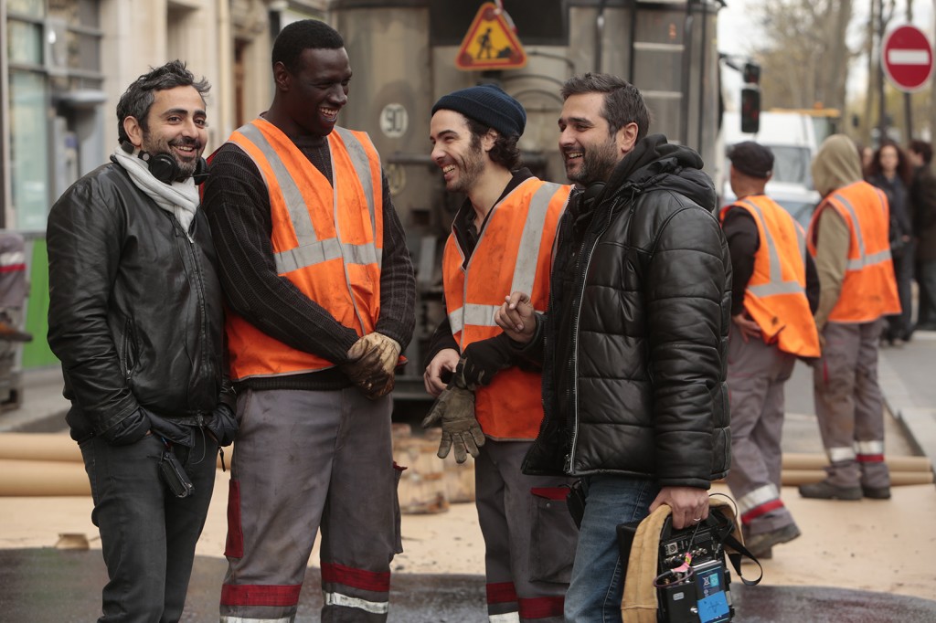 Eric Toledano, Omar Sy, Tahar Rahim et Olivier Nakache sur le tournage de Samba: un futur triomphe public? 